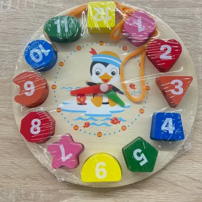 "L’Heure des Pingouins : Horloge Éducative en Bois"